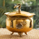 Decorative brass handi with lid crafted in elegant design featuring rope neck detailing floral accent and ribbon bow finish
