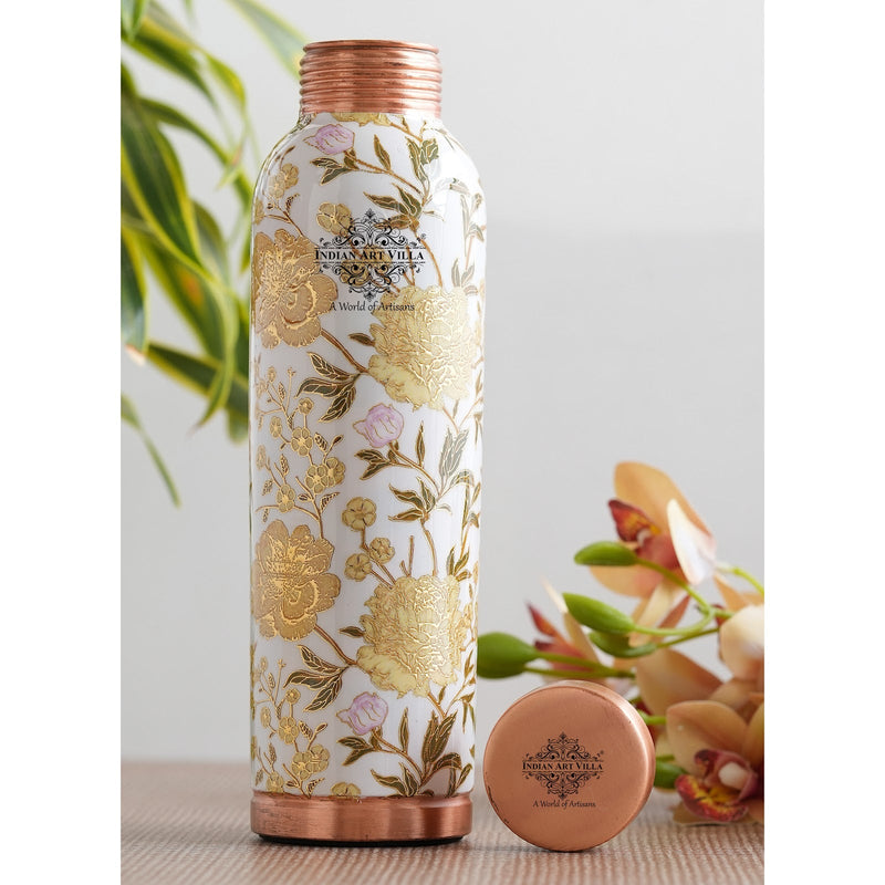 Handcrafted by Indian Art Villa, this 900ML GoldFlowerPrint copper bottle captures heritage and contemporary style