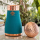Indian Art Villa silk finish copper bottle for bedrooms in elegant sky color with hammered surface and copper lid beside