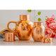Traditional hammered copper jug with surai silhouette and bowl lid made for Indian kitchens and health friendly use case