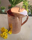 Decorative 1000ml copper jug with rich embossed design and brass lid, serveware by Indian Art Villa