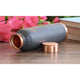 Elegant copper bottle with matte gray surface designed for bedside use and night time water storage by Indian Art Villa