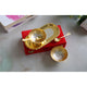 Indian Art Villa gift set of two brass bowls with detailed silver and gold finish placed neatly on oval shaped tray